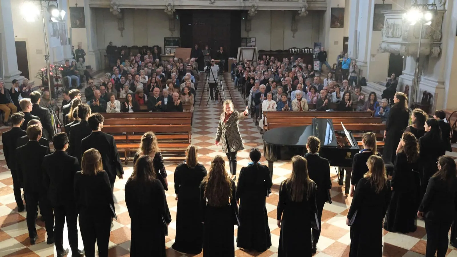 view from the back of the choir facing the attendees in Pordenone church