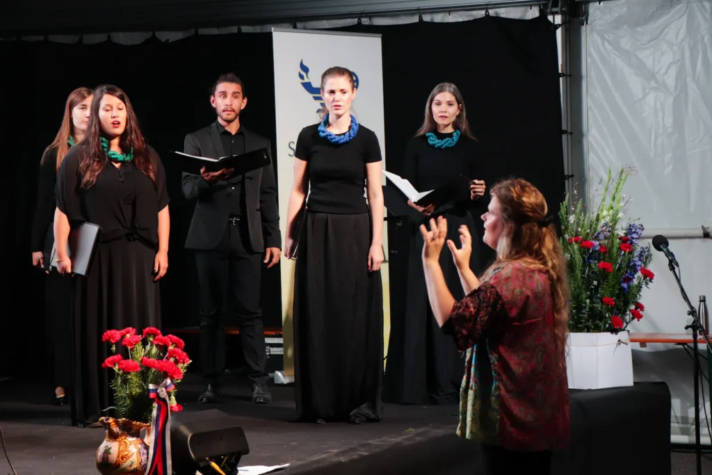 Choir members from the Vikra Chamber Choir performing in Draga in 2023