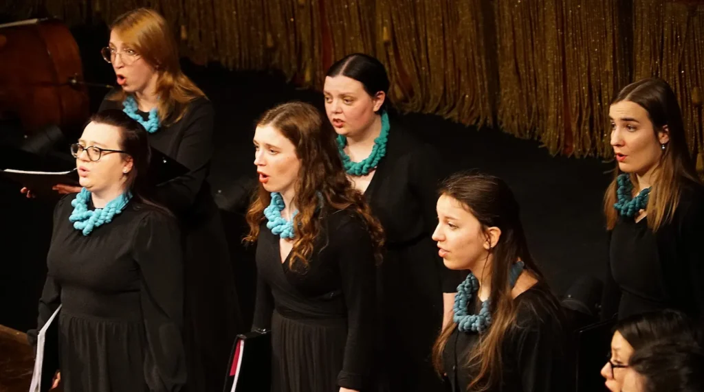 Group photo of Vikra chamber Choir performing in Modena
